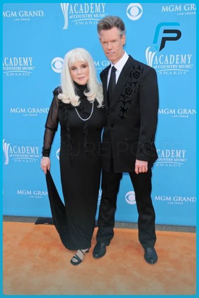 Elizabeth Hatcher-Travis and husband